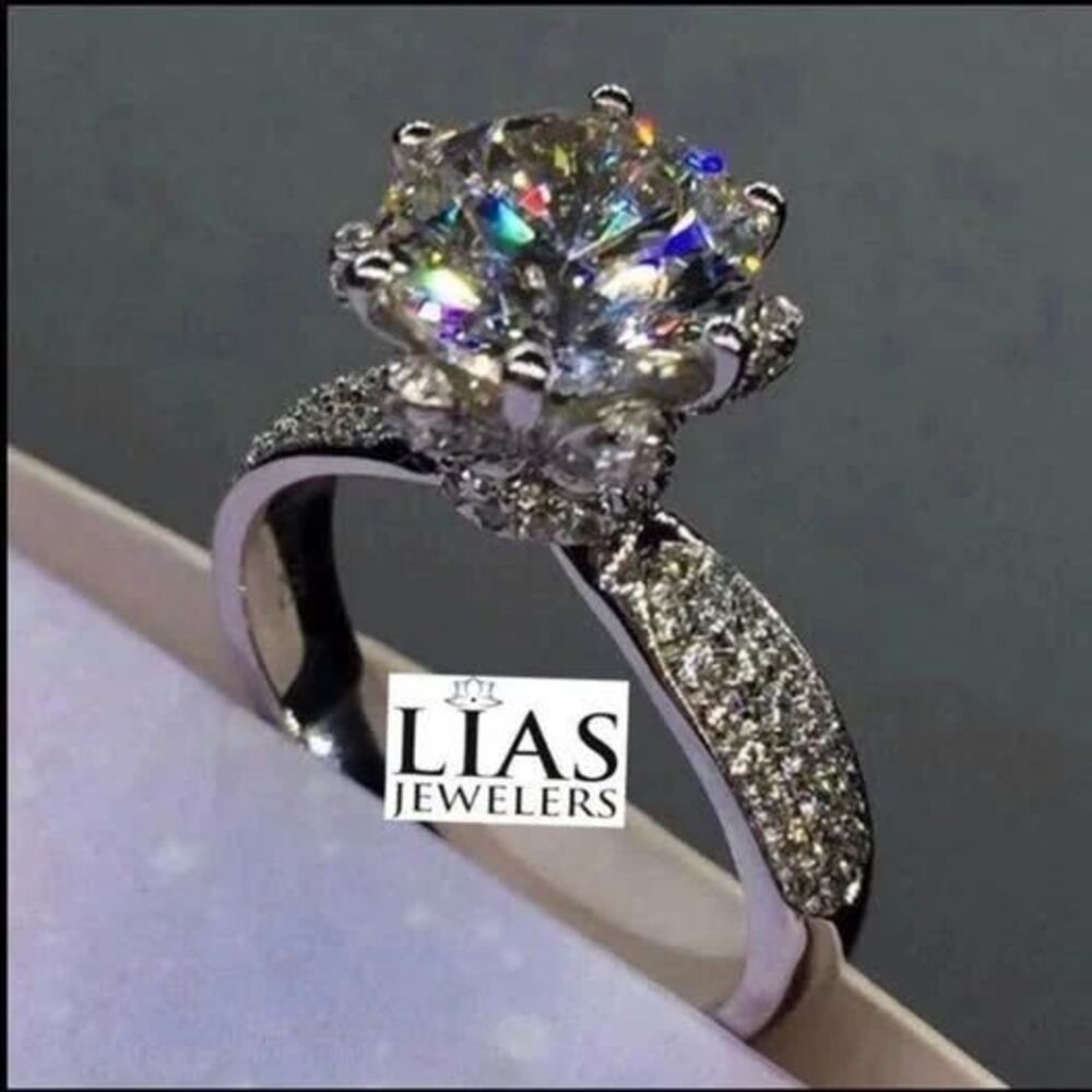New 18k white gold engagement ring